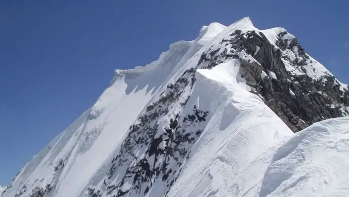 A mountain summit with cornices.