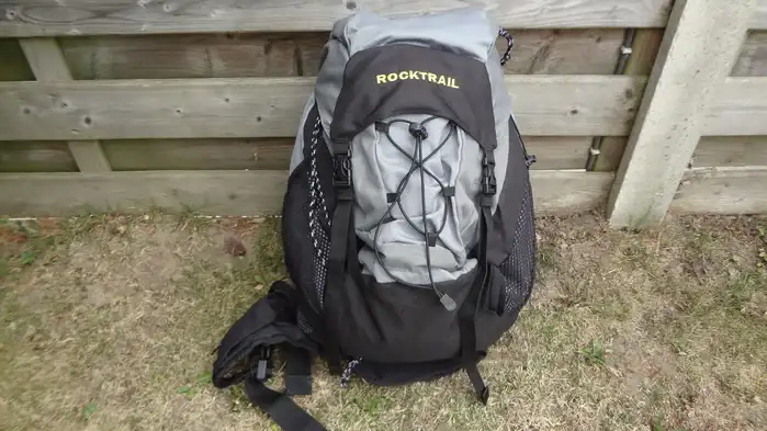 A hiking pack with a lid.