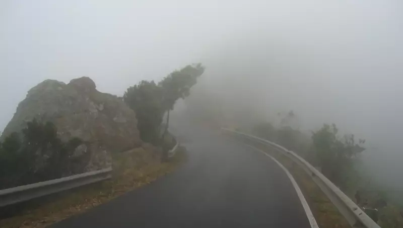 Walking along the road in the cloud.